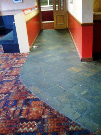 Slate floor in a Working mans club renovated by Tile Doctor Warwickshire